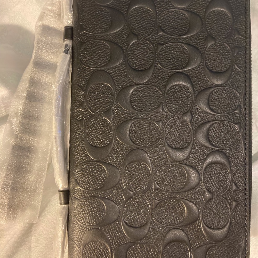 Brand new! Never used Coach Travel Wallet